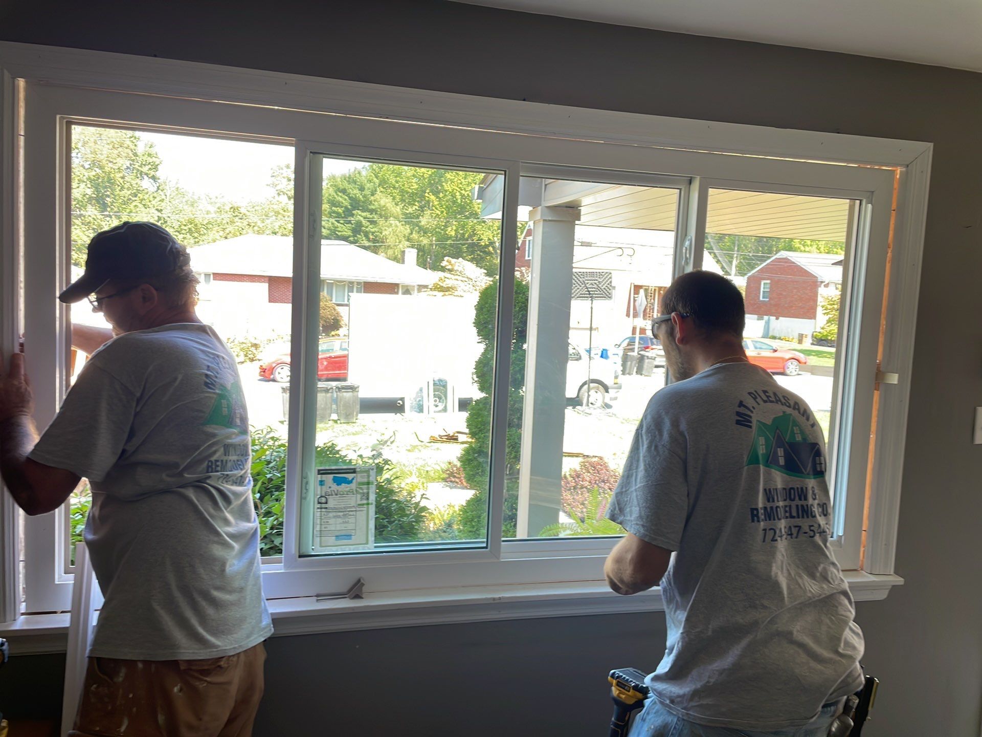 Installers working on Window in McKeesport