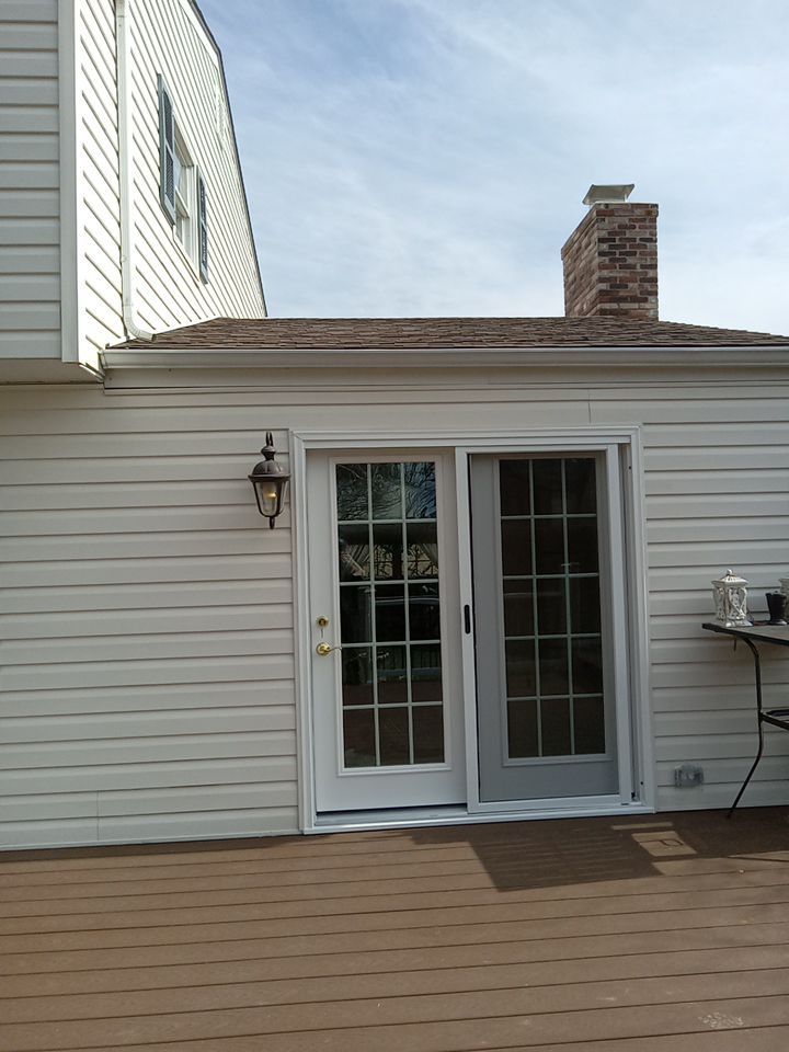 New Swing Patio Door in Plum by Mt. Pleasant Window & Remodeling