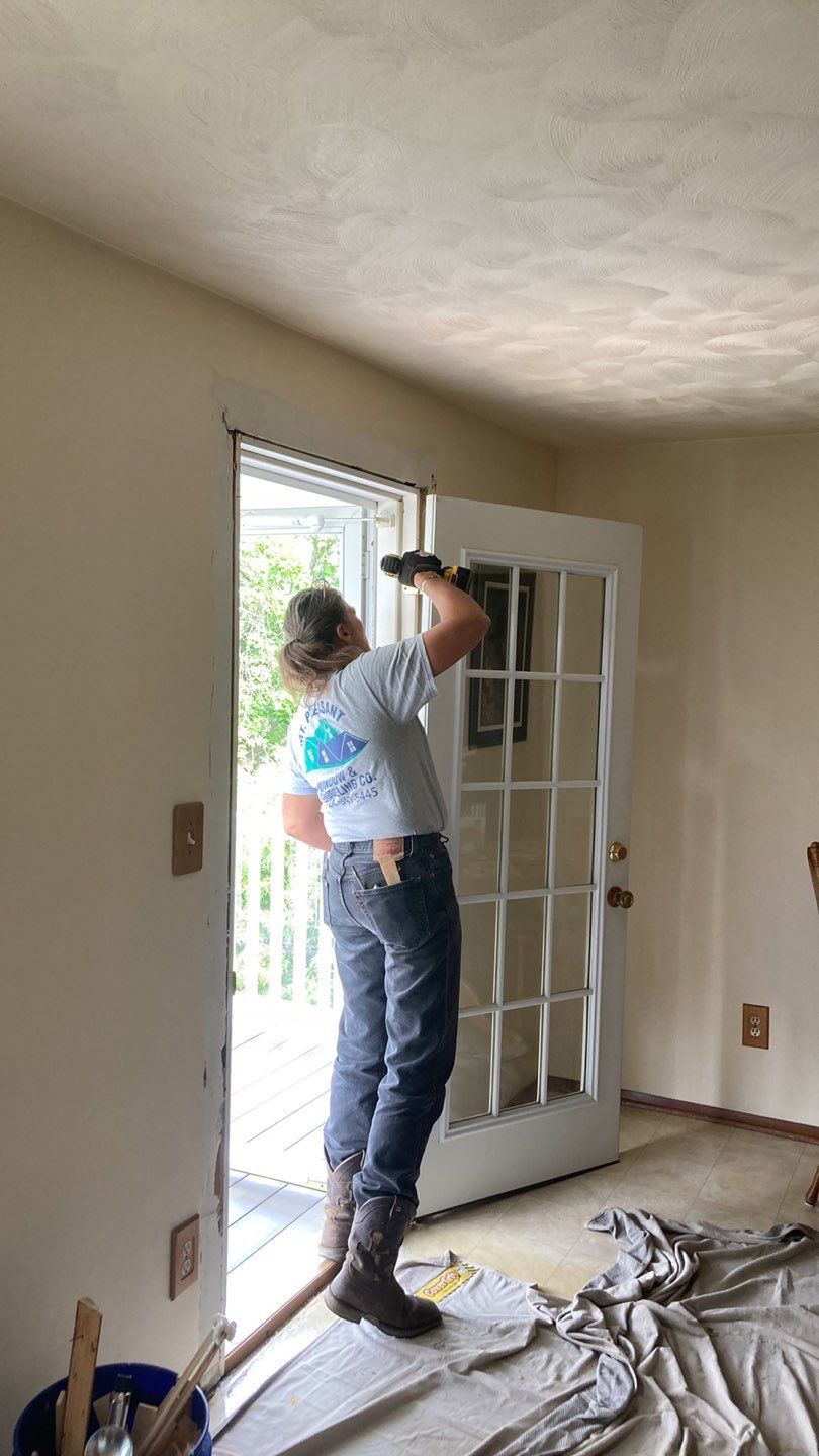 Installer Michele working on door in Greensburg