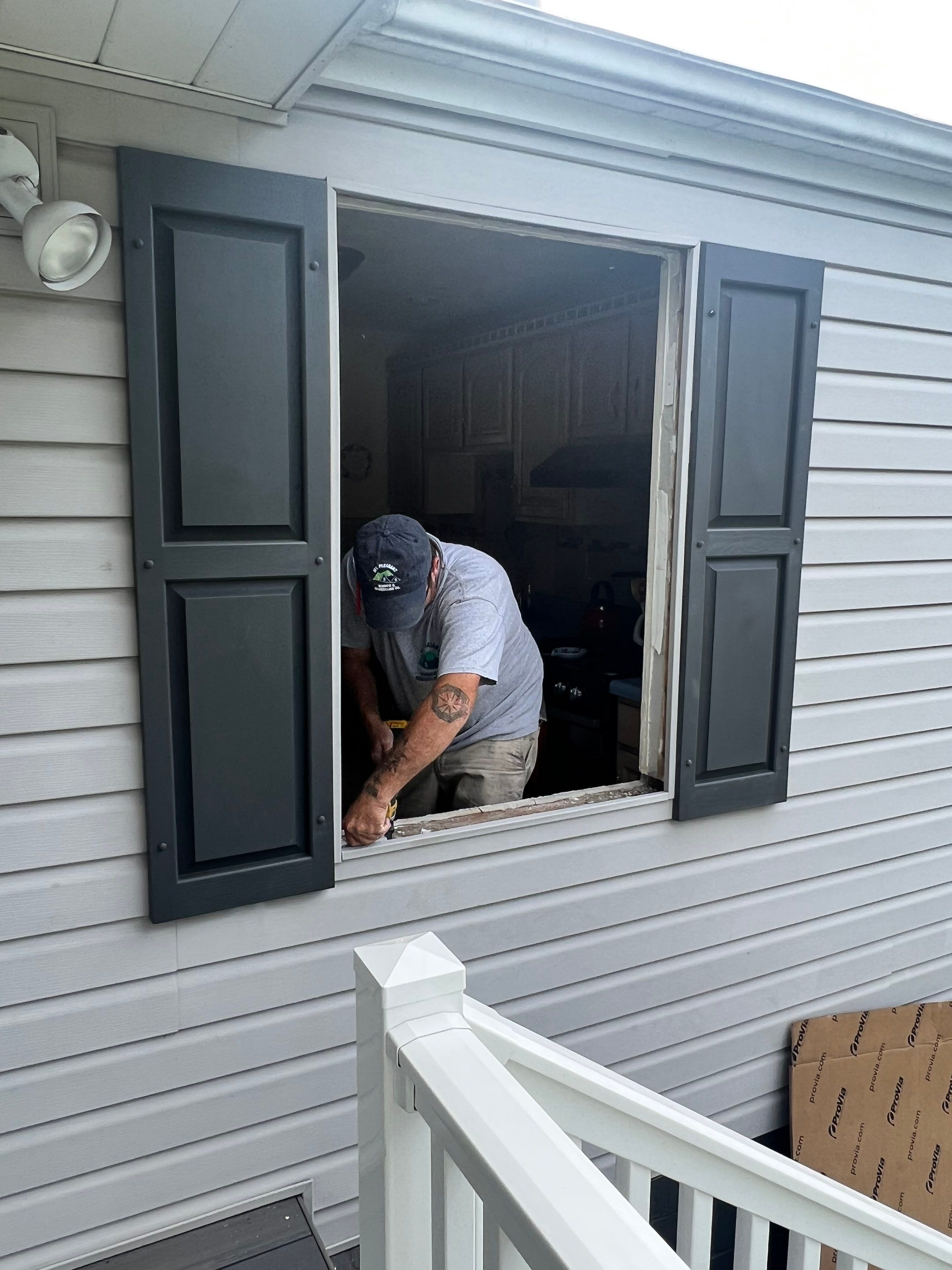 Lead Installer Joe working on Window in Greensburg