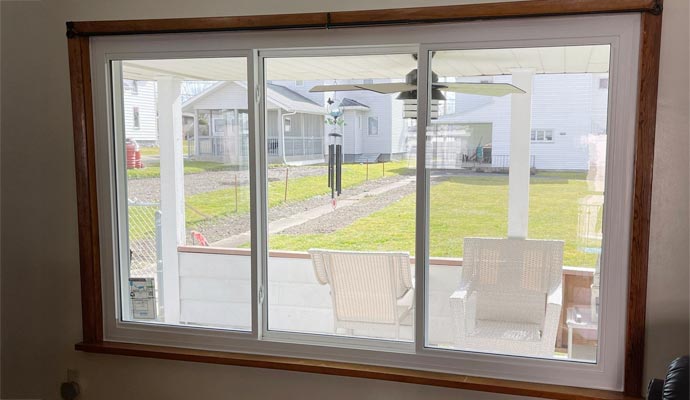 Picture window with backyard patio view