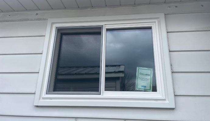 Installed vinyl slider window